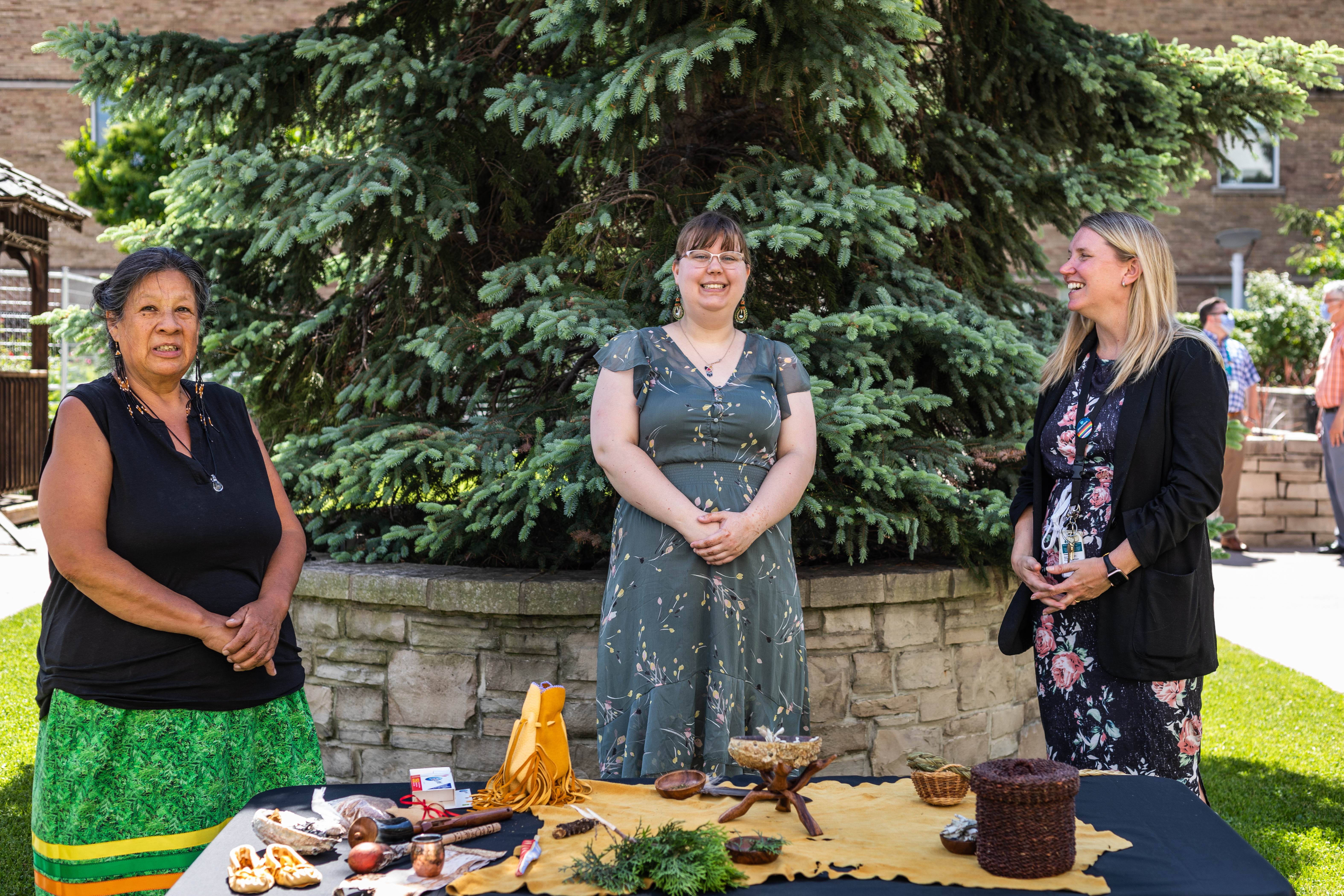 pictured left to right: Marie Jones, Traditional Healer at De dwa da dehs nye>s Aboriginal Health Centre; Kiara Alich, Aboriginal Patient Navigator at the De dwa da dehs nye>s Aboriginal Health Centre; Melissa Farrell, President at St. Joseph’s Healthcare Hamilton